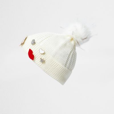 Girls cream knit badge bobble hat